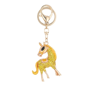 Golden horse keychain with yellow rhinestones and glossy enamel on a lobster clasp