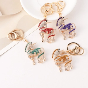 Porte-clés licorne étincelants avec strass en quatre couleurs et mousquetons dorés