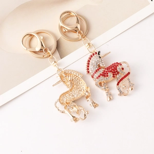 Porte-clés et broche licorne de dessin animé avec cristaux rouges et blancs scintillants