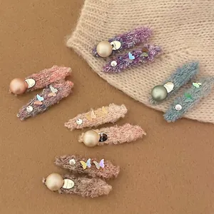 Chic butterfly wool yarn hair clips set with faux pearls and sparkling sequins for women