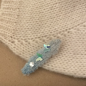 Light blue knit butterfly hair clip with holographic sequins and crystal rhinestones