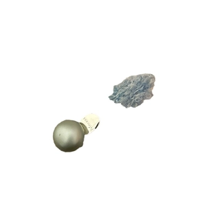 Elegant grey pearl earring with silver princess engraving on a white background
