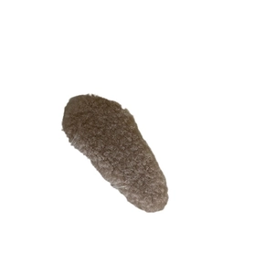 Plush faux fur cream puff hair clip in coffee brown color with fluffy autumn texture