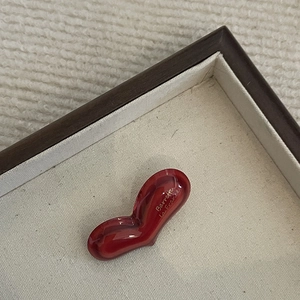Red French heart-shaped hair clip with glossy finish and Barrette La France gold text