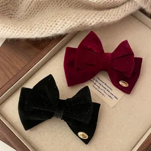 Elegantes pinzas para el cabello con lazos de terciopelo rojo vino y negro con toques dorados