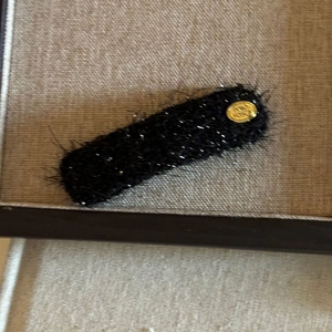 Brown plush hair clip with silver glitter and a vintage gold metal button detail