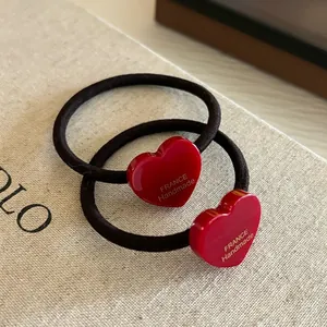 Lot de deux élastiques à cheveux cœur rouge en acétate avec inscription artisanale