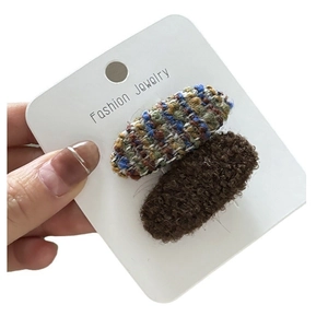 Set di fermagli per capelli in tweed e peluche con trame intrecciate blu e marroni