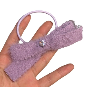 Plush purple heart bow hair tie with a transparent crystal gem for cute hairstyles