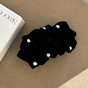 Elegant black velvet hair clip with white pearls and ruffled texture for women