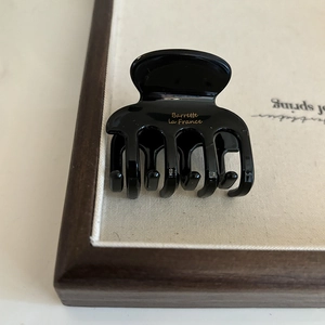 French style black glossy hair claw clip with golden Barrette la France lettering