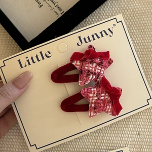 Simpatiche mollette a stella in tweed rosa con fiocchi di velluto rosso per bambine