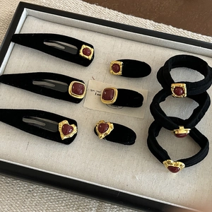 Vintage black velvet hair clip set with red resin stone and matching hair ties