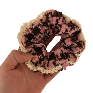 Pink and black houndstooth scrunchie with lace trim edges for an elegant hair style