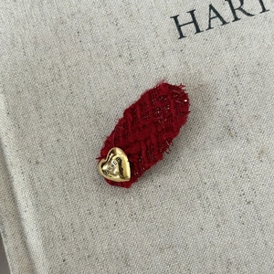 Red tweed hair clip with gold heart charm and Harmer engraving on vintage linen