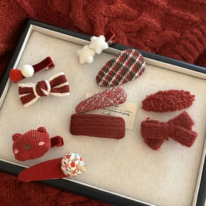 9-piece set of cute red bow and bear hair clips for women with festive knit textures
