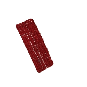 Red tweed fabric hair clip with red white and gold woven fringe for women