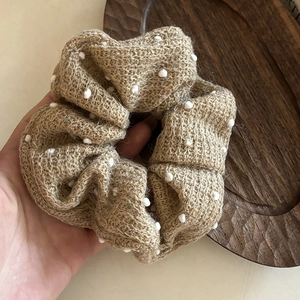 Earthy knitted polka dot scrunchie with white pom poms for women ponytail hair tie