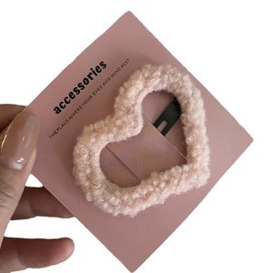 Pink plush heart hair clip with soft lamb wool texture and sturdy metal BB clip base