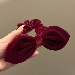 French style burgundy velvet bow hair scrunchie with elegant texture for ponytail styling