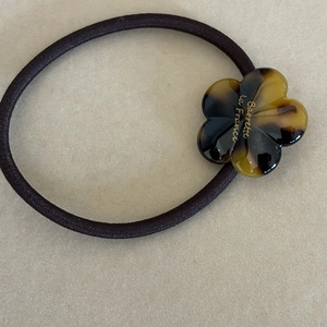 French style acetate floral hair tie with tortoise shell pattern on elastic band