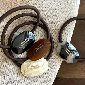 Lot d'élastiques à cheveux ovales colorés avec inscription française élégante