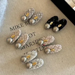 Elegant tweed hair clips set with metallic pearls and gold Love charms for women