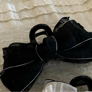 Elegant black double-layer organza bow hair claw clip with white edge detail