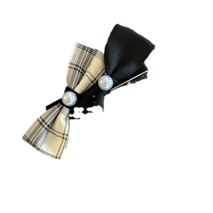 Classic black and white plaid bow hair clip with elegant pearls and preppy style