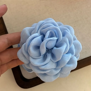 Handmade light blue fabric rose flower hair claw clip with multi-layered 3D petals design