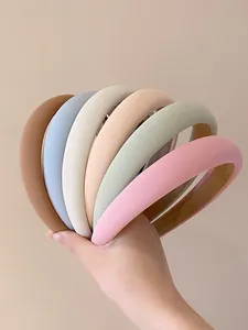 Detailed set of six colorful padded sponge headbands in matte fabric with soft texture