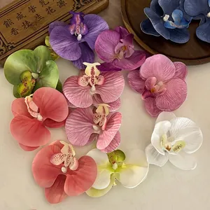 Vibrant Phalaenopsis orchid hair clips in multiple colors for seaside vacation styling