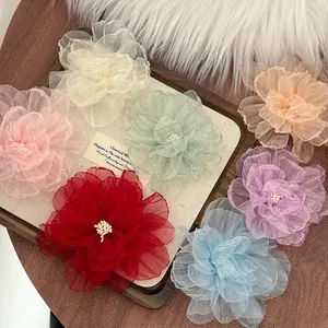 Handmade organza flower hair clips in seven pastel colors for spring vacation