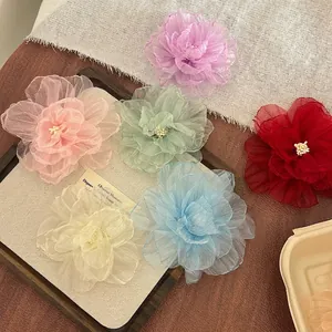 Handmade organza flower hair clips in six vibrant colors for spring vacation styling