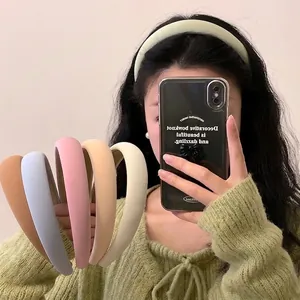 Padded sponge headband in various candy colors for a stylish high crown look