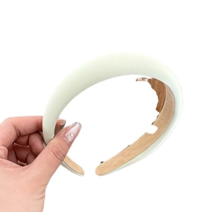 Padded sponge headband in light candy color for minimalist hair styling and volume boost