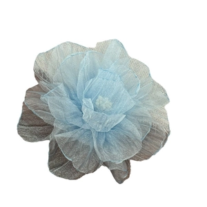 Floral hair clip with layered sky blue and light gray mesh petals for vacation style