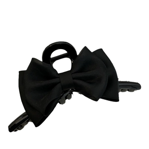 Elegant double-layered black bow hair claw clip for women with a vintage glossy finish