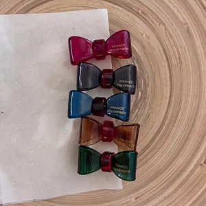 Set mit 5 eleganten, durchscheinenden Acetat-Schleifen-Haarspangen in Vintage-Farben
