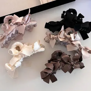 Eleganti mollette per capelli con fiocco in raso in vari colori per uno stile dolce