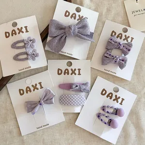 Détails de barrettes à cheveux violettes en tissu avec perles et motifs variés pour filles