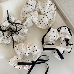 Polka dot ribbon lace hair scrunchies set in cream white and black for elegant styling