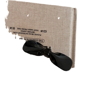 Elegante fermaglio per capelli a fiocco nero lucido realizzato in resina acetata
