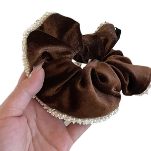Elegant velvet hair scrunchie with pearl trim in deep brown for high elasticity hairstyles