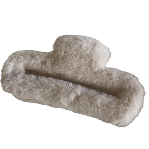 Minimalist beige plush shark hair claw clip with faux fur for autumn winter hair styling
