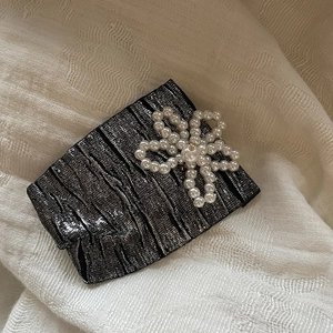 Elegant pearl flower hair clip with silver-black metallic pleated fabric for women