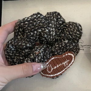 Retro dark brown tweed knit scrunchie with embroidered patch for autumn hair styling