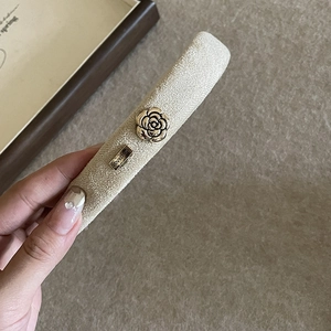 French vintage beige fabric headband with golden camellia and engraved metal tag