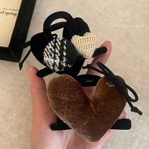 Vintage velvet heart hair claw clips for women featuring plaid and knit heart designs