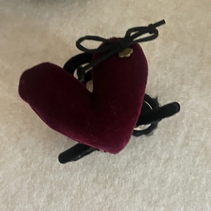 Vintage burgundy velvet heart hair claw clip with a black bow and gold flower detail